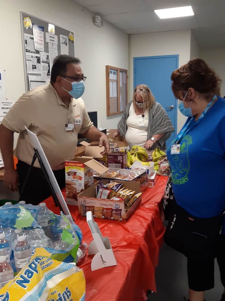 FUTURES Board Member David Jimenez serving refreshments