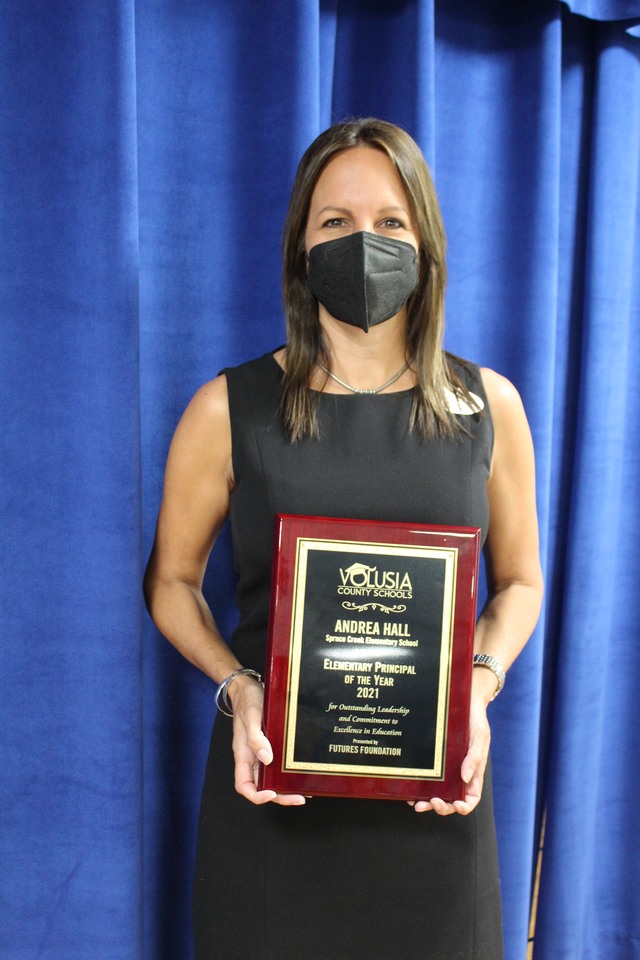 Andrea Hall with award