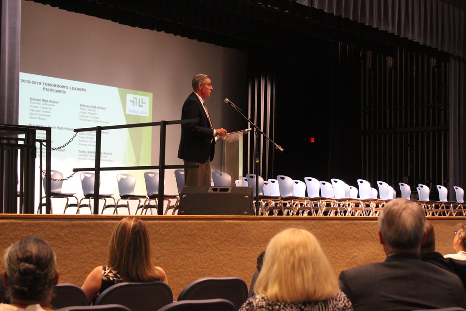 Supt. Tom Russell congratulating students